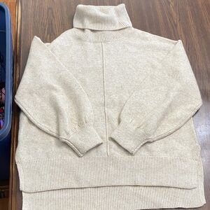 Gypsy Cloud size large cream/tan turtleneck sweater